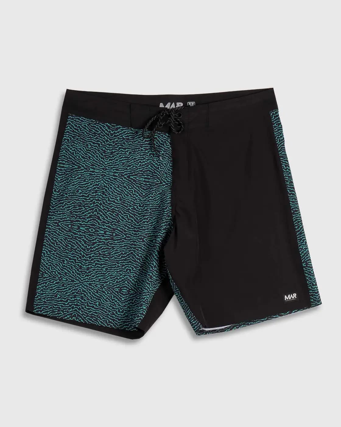 Black MAR boardshorts with turquoise patterned side panels on a grey background.